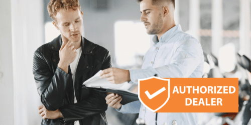 Afbeelding met dealership en authorized check op